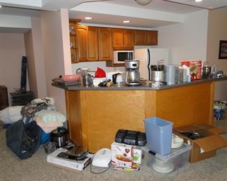 Large collection of small kitchen appliances in the lower levels, second kitchen