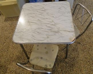 See told you..........Table + Chairs = Mid Century Modern Kiddos set