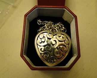 Wonderful, Mothers Day gift this heat shaped pendant is