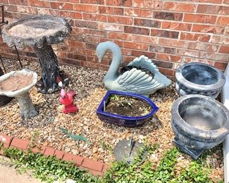 Concrete planters,  bird baths, and yard art  