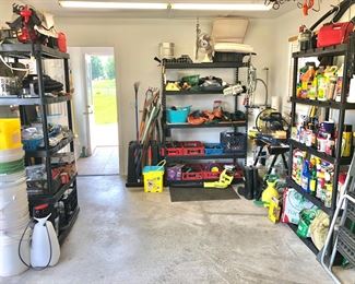 Detached shed packed with more tools and outdoor items  
