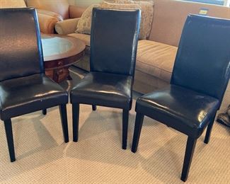 Three Black Vinyl Dining Chairs