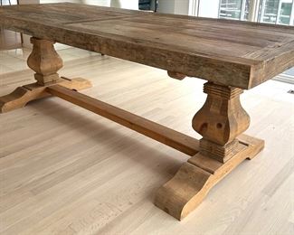 Olde Door Company Emma Dining Room Table in Natural Wood. Crafted from old doors with some dating back hundreds of years is what makes Old Door products so special and unique, textures and depth that only come with age. Created and aged in nature, refined by humans hands. 

Features a reclaimed elm top paired with a pine base. Measures 36” x 94” x 31” 