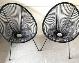 Pair of Acapulco Black Woven Lounge Chairs each measuring 34x29x28 inches