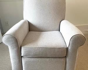 Pottery Barn Kids Swivel Reclining Glider that measures 37x33x33 inches when in the upright position. This is in very good condition! Item located in the garage for easy removal. 