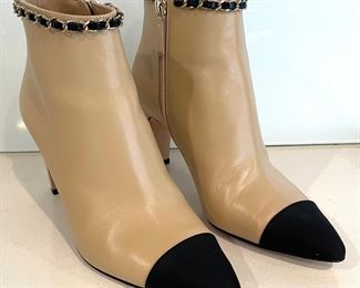 Chanel Boots are a size 37.