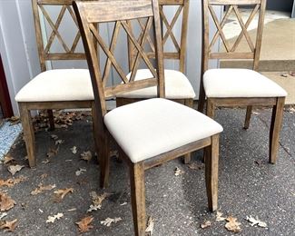 Set of 4 Wooden Chairs with Upholstered Seats. The chairs measure 39 inches tall
