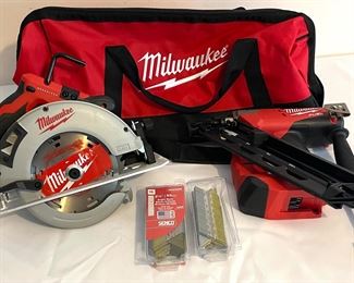 Milwaukee Tools Duffle Bag, 7-1/4 Circular Saw and Finish Nailer with Nails. There are no chargers included and both look to be battery operated. These items were not tested. 