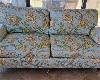 Down sofa, one of two up for auction