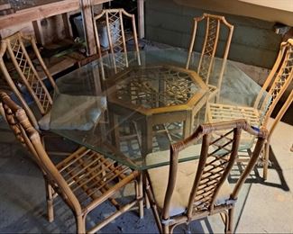 Rattan chairs, glass top table