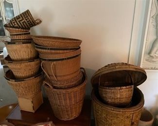 Large Antique Southeast Asian Bamboo Rattan Storage Basket With Square Wood Base Vietnam Tribal Basket 30 inches high, plus assorted other rattan baskets.