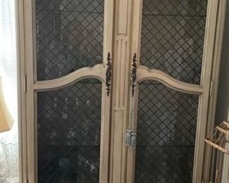 Matching Davis Company china cabinets.