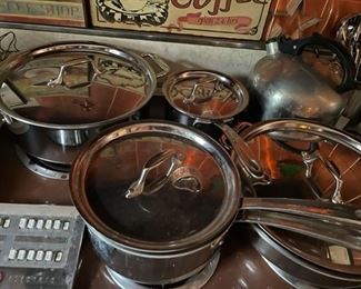 Set of AllClad pots and pans.