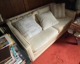 Pair of leather love seats.