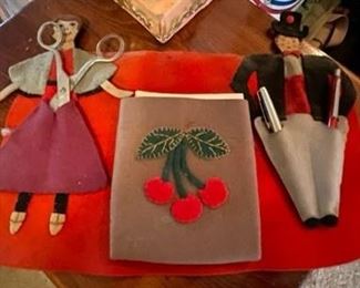 Hand-made felt holder for sewing items.