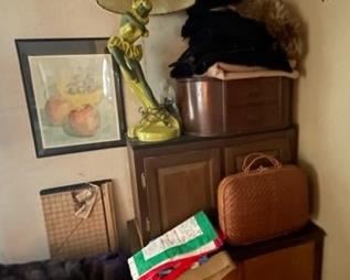 Fun vintage lamp and suitcases.