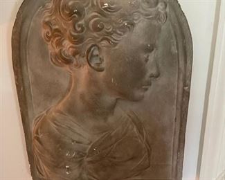 Bas-relief of the child Saint John the Baptist .