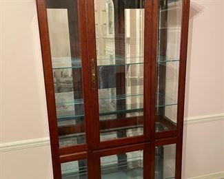 Large lighted curio cabinet