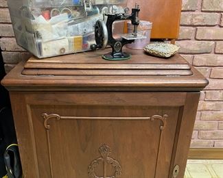 Antique sewing cabinet