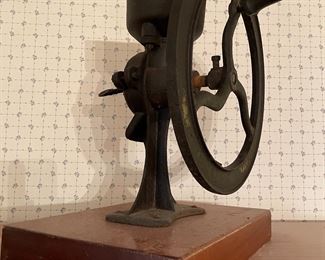 Antique fly wheel coffee grinder