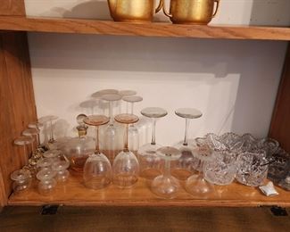 Golden crusted items and lots of glass ware