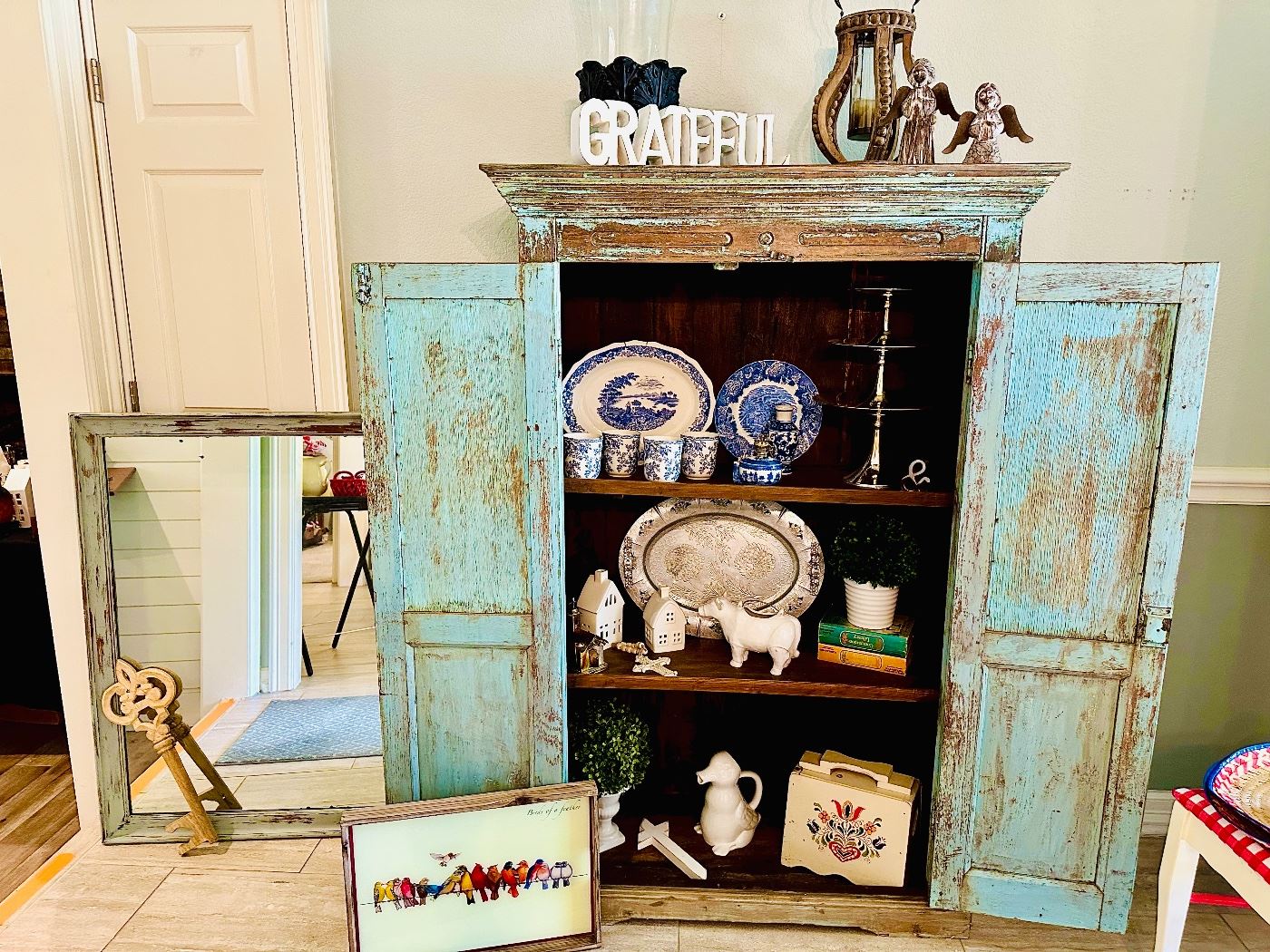 Farmhouse cabinet
Blue and white dishes
Tiffany blue cabinet