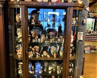 Antique china cabinet and Royal Doulton Toby mugs