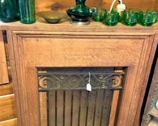 antique teller window and green glassware