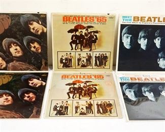 1009 LOT OF 6 BEATLES VINYL ALBUMS INCLUDES STEREO & MONO VERSIONS OF RUBBER SOUL, BEATLES '65 & MEET THE BEATLES, SOME MISSING SLEEVES & SOME STAINING & SPLITS ON COVERS