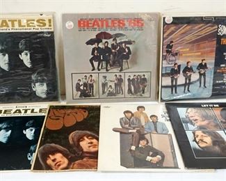 1011 LOT OF 7 VINYL BEATLES ALBUMS INCLUDES BOTH MONO & STEREO VERSIONS OF MEET THE BEATLES, THE BEATLES YESTERDAY & TODAY, LET IT BE, SOMETHING NEW & BEATLES '65, COVER IS STAMPED PROMOTIONAL COPY & RUBBER SOUL, COVER HAS STAINING & SPLITS