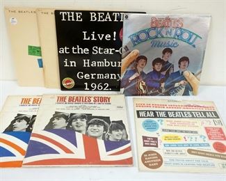 1016 LOT OF VINYL BEATLES ALBUMS INCLUDES THE BEATLES AT HOLLYWOOD BOWL, LIVE AT HAMBURG, BEATLES ROCK & ROLL MUSIC, THE BEATLES STORY & THE BEATLES TELL ALL, SOME COVERS MAY HAVE STAINING, SIGNS OF WEAR, ETC