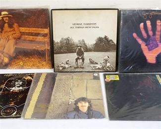 1024 LOT OF GEORGE HARRISON VINYL ALBUMS INCLUDES ALL THINGS MUST PASS, DARKHORSE, LIVING IN THE MATERIAL WORLD, LIVE IN JAPAN, SOMEWHERE IN ENGLAND W/PROMO STAMP ON COVER & THE BEST OF GEORGE HARRISON