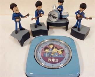 1049 BEATLES COLLECTIBLES LOT INCLUDES WALL CLOCK & MCFARLANE TOYS BEATLES FIGURES HAS EXTRA RINGO W/DRUM PARTS, DOLLS ON STANDS APPROXIMATELY 9 1/2 IN, CLOCK APPROXIMATELY 10 IN SQUARE