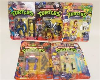 1160 FIVE TEENAGE MUTANT NINJA TURTLES ACTION FIGURES NEW ON CARDS. PLAYMATES RANGE FROM 1989-1992