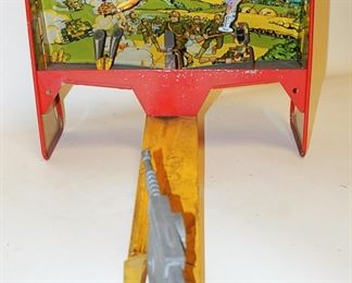1173 MARX WWII ERA TIN LITHO NATIONAL DEFENSE TARGET PRACTICE ARCADE TYPE TOY. HAS SOME PAINT LOSS. APP. 22 IN X 11 IN H X 12 1/2 IN W.
