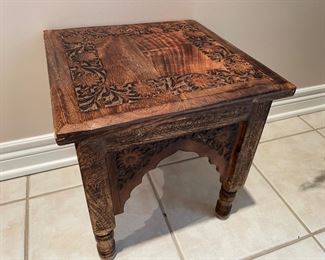 Carved wooden foot stool