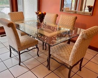 Iron glass top kitchen table with upholstered chairs (1 chair needs repair)