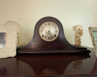 . . . an antique mantle clock