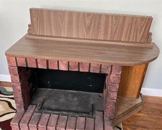 faux fireplace turns into table