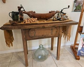 This table is 45" x 22" and 2" thick.
It was carried out of the jungles in Brazil many years ago on house owners back.