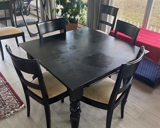 Pottery barn rustic table. Can expand to seat 6 with two leaves.
Seat cushions need replacement.