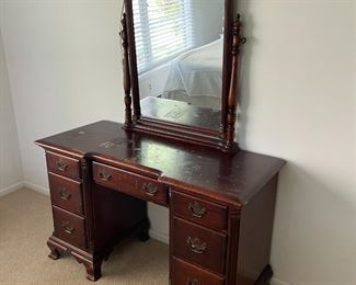 Antique cherry. Solid structure but needs to be refinished.