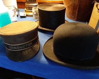 The conductor's hat goes with the conductor's uniform.  