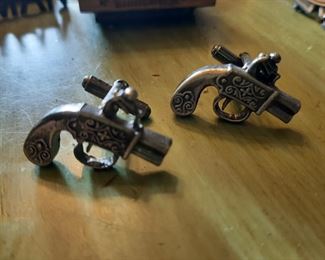 Cufflinks, not real derringers