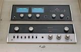 High-end vintage McIntosh audio components, with all original paperwork, built in to a custom fabricated stereo cabinet. (91” x 21”)