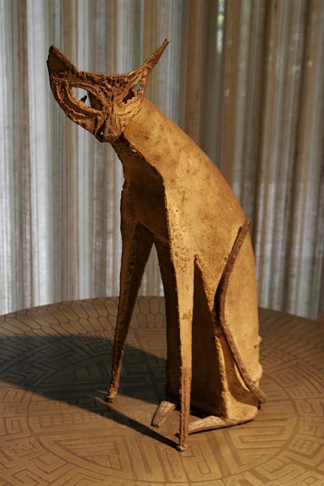 A fantastic, Outsider Art sculpture of a mysterious cat, created from pieces of welded iron