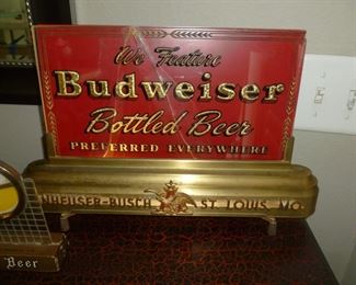 Antique lighted beer sign in coolest metal holder..(unfortunately the glass has been cracked)