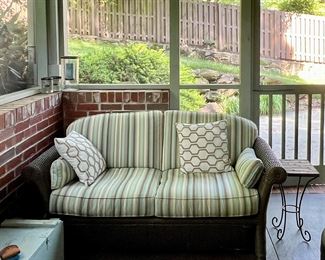 Wicker loveseat (2); wicker and iron side table; pillows