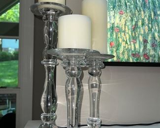 Glass candle holders with candles