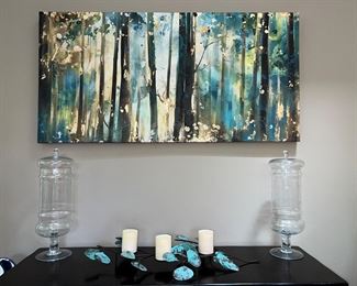 Wall canvas art; lidded apothecary jars; candle holder w/candles